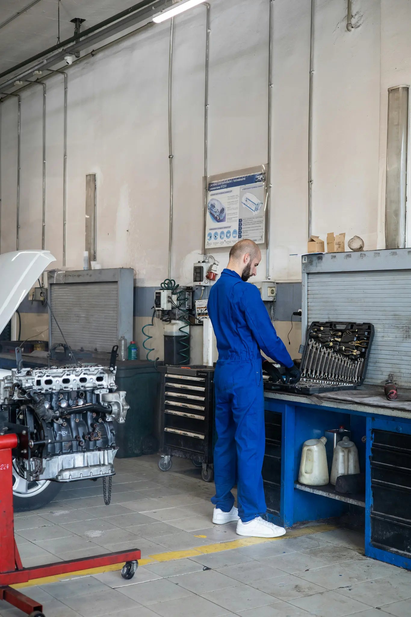 mechanic grabbing tools